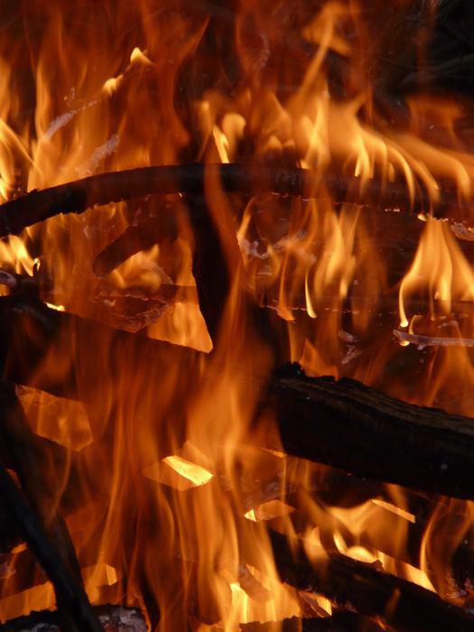 Wood in the beautiful orange and yellow flame