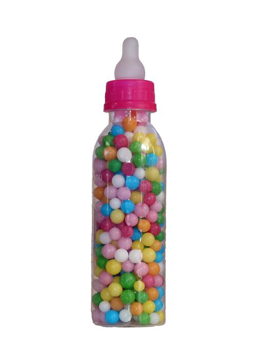 Nuckel bottle with the colorful nonpareils, at white background