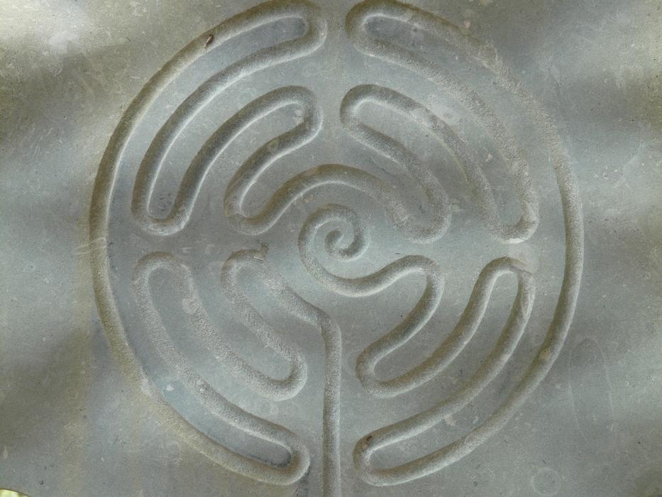 Painted maze as on the grey wall