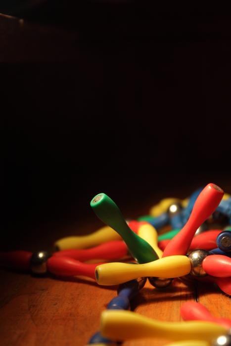 Beautiful and colorful sticks with magnets, in light