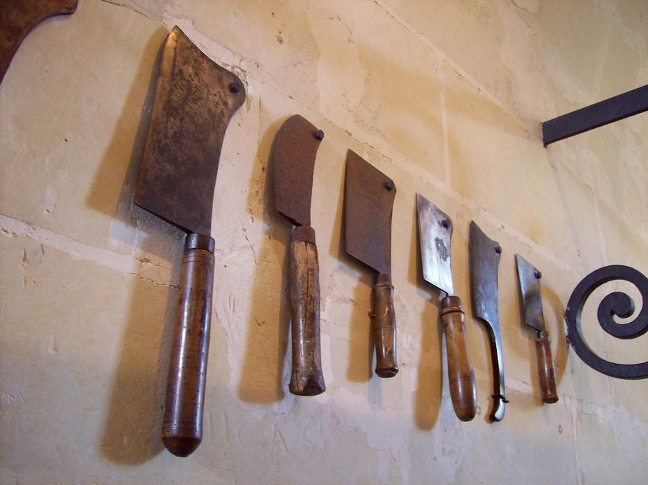 ancient metal knives in the old kitchen