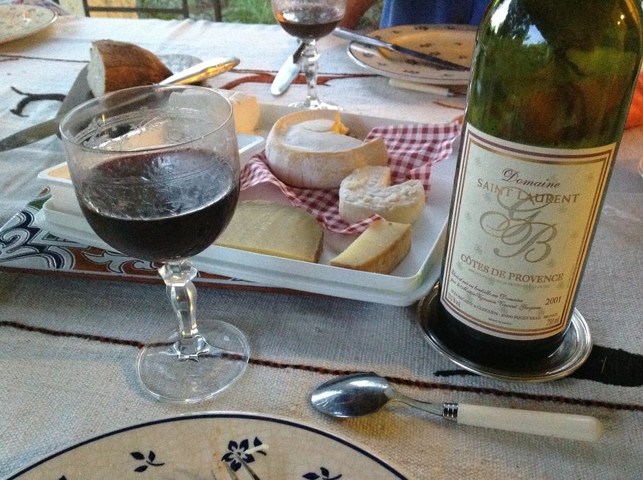 Red Wine and cheese on table