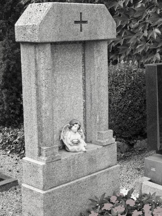 Grave with christian Tombstone