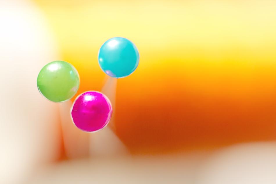 close up view of colorful pins