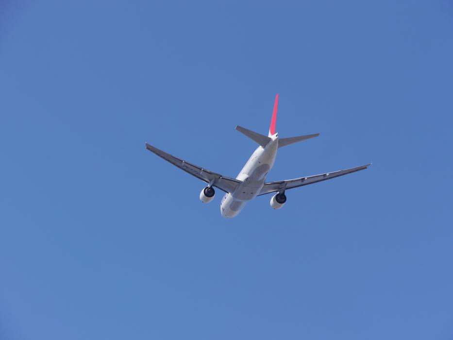 airliner in the bright blue sky