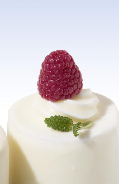 Beautiful, white tart cakes, with the raspberry and mint, in light