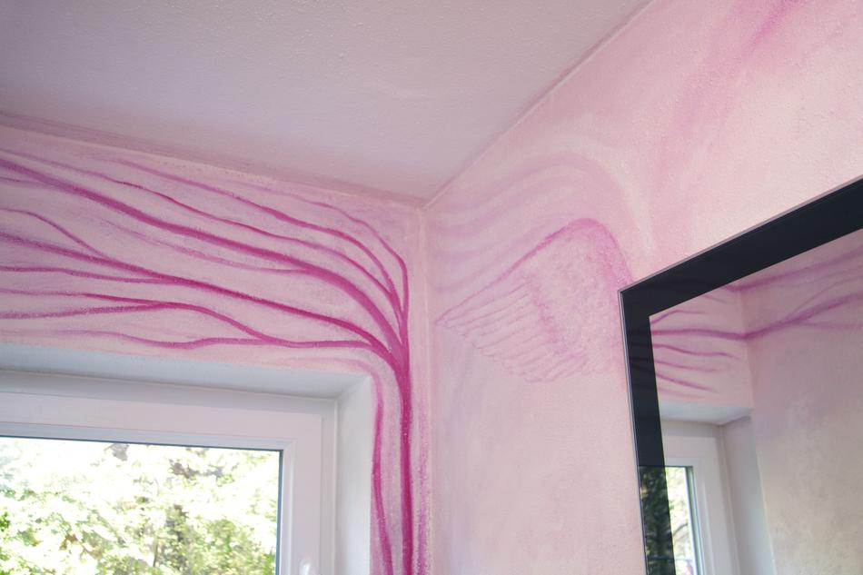 pink graffiti as wall design in the room