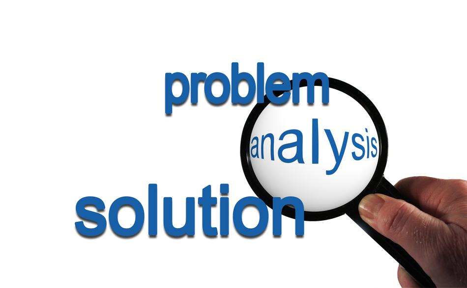 magnifying glass over words problem analysis solution