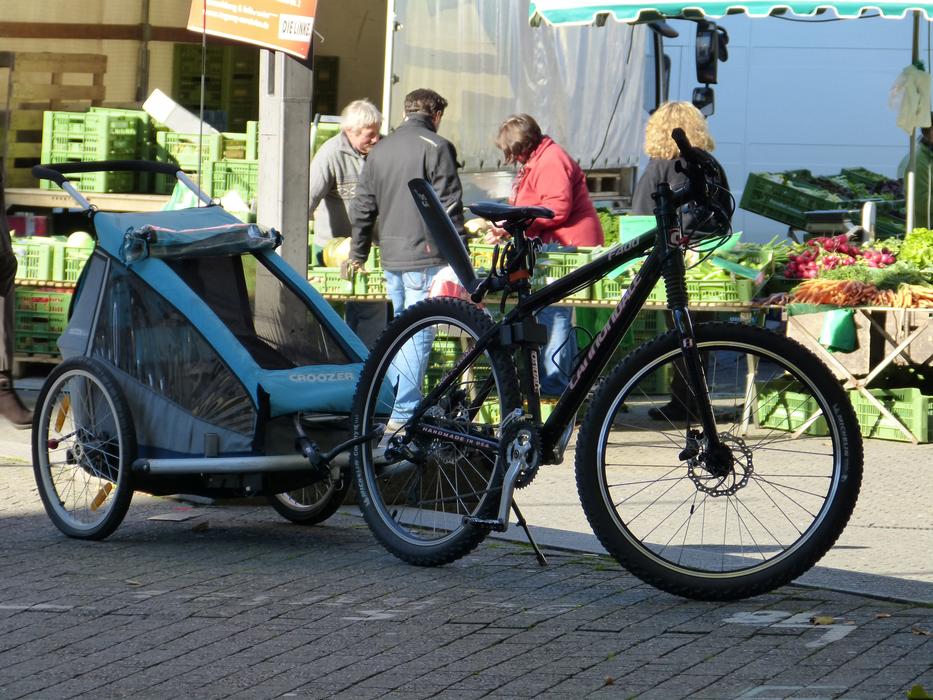 Bike, near the people, on the colorful market