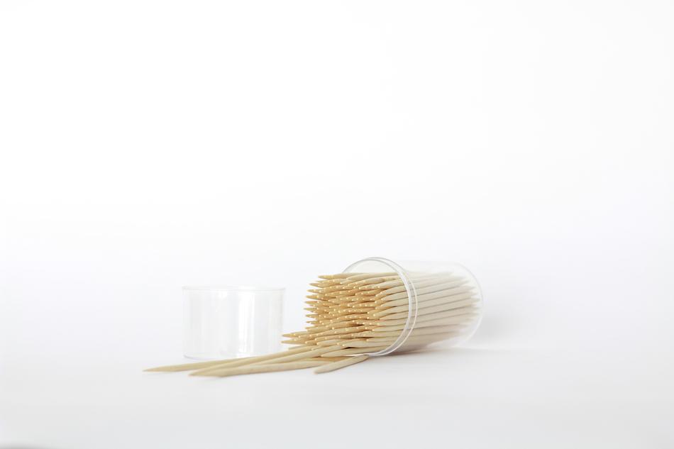 scattered wooden toothpicks