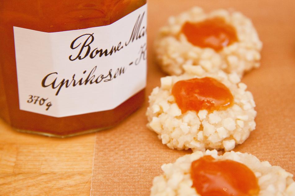 Beautiful, orange 'Bonne Maman' apricot jam and Christmas cookies