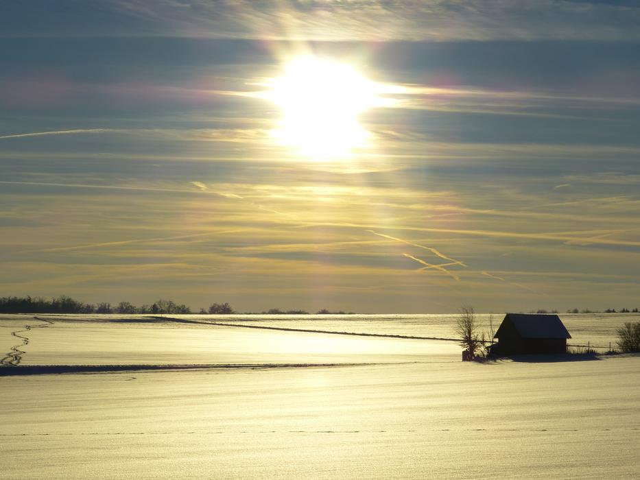 house among the fields in winter