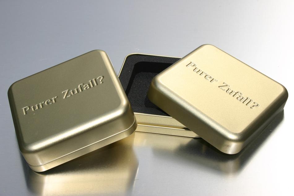 Shiny slip lid tins on the shiny surface