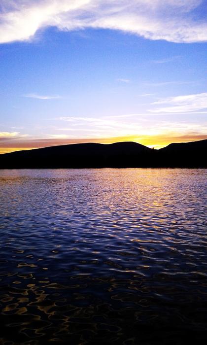 view from the water of benavente zamora at dusk
