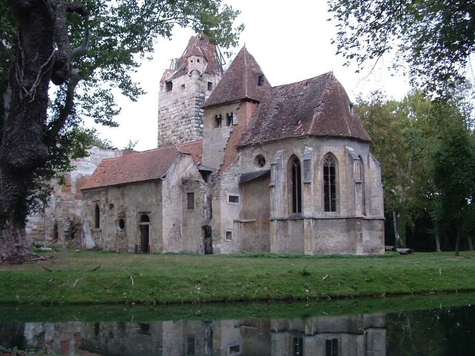 old tower and lake