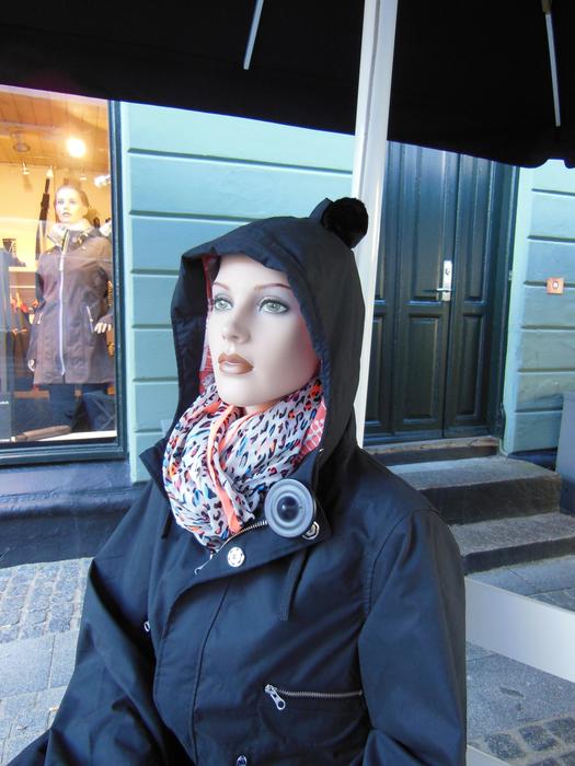 mannequin in black jacket with hood