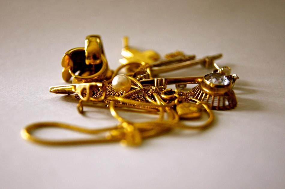 Gold Jewellery Chain close-up in blurred background