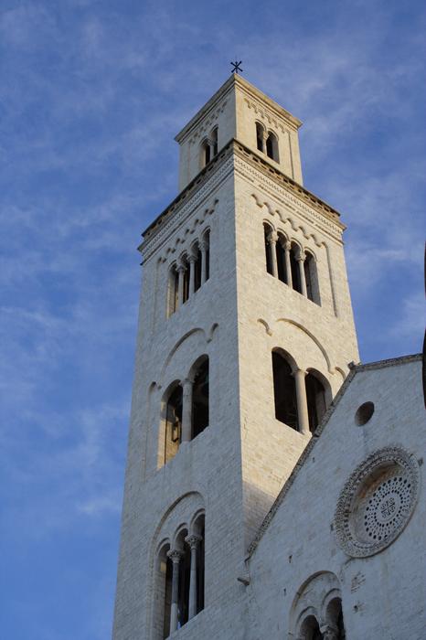 tower on the cathedral against the backdrop of a cloudy sky