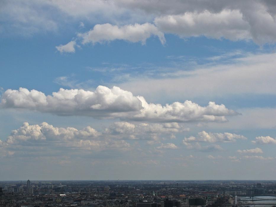 Clouds over big city at Spring