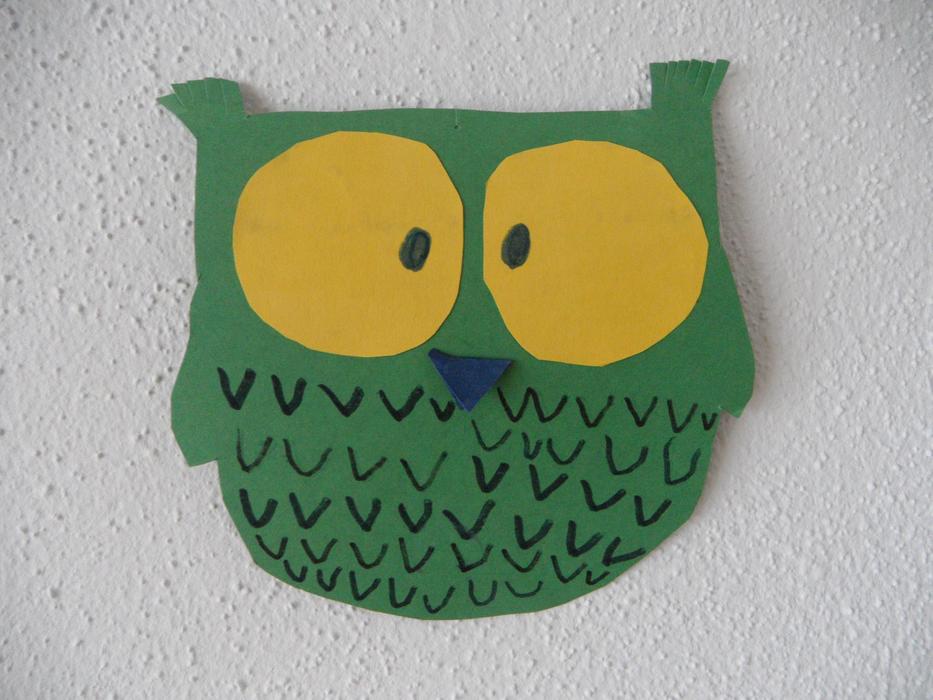 children's craft in the form of a green owl