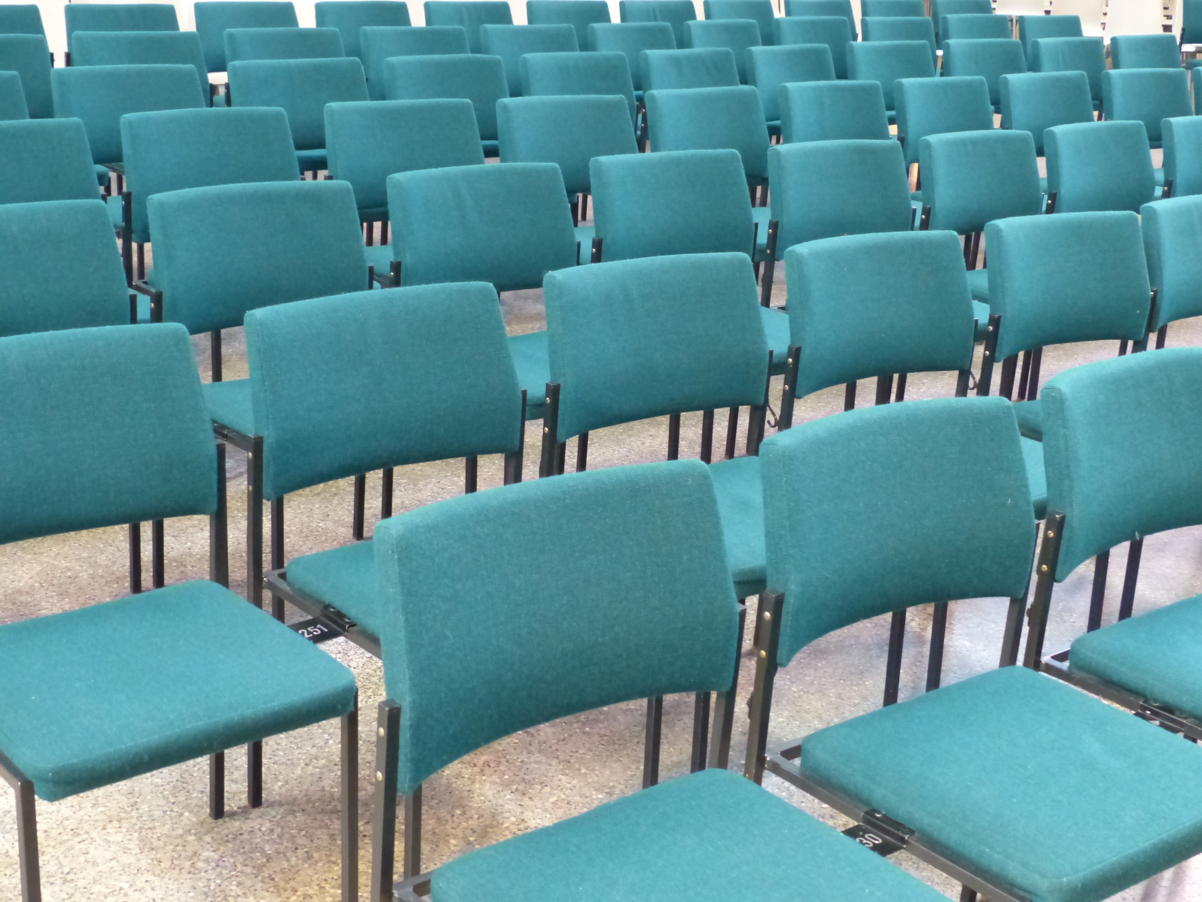 Blue chairs in the audience free image download