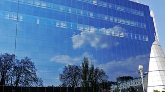 Clouds Sky and trees on mirror reflection