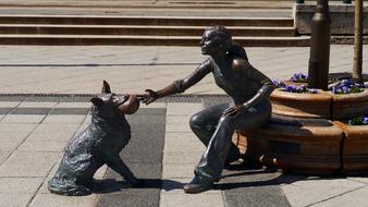 Bronze Statue of girl and dog