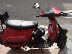 Red Scooter on road