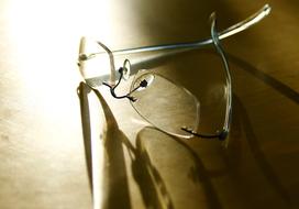 Close-up of the shiny glasses in light, with reflection