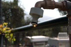 Faucet at Sun Reflection