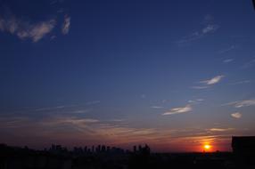 Beautiful landscape with trees, at colorful and beautiful sunrise on horizon, with clouds