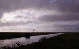 Beautiful landscape with the river in VendÃ©e, France, under the clouds