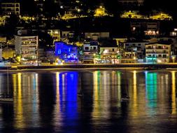 Beautiful Port De SÃ³ller with colorful lights, in Mallorca, at the night