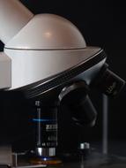 white microscope in the laboratory