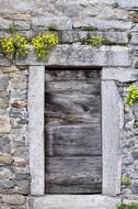 Wood Door In Stone Arch