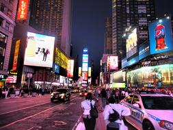 Cityscape of Times Square with colorful lights, in New York, USA, at the night