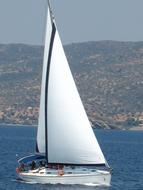 Sailboat in Mediterranean Greece sea