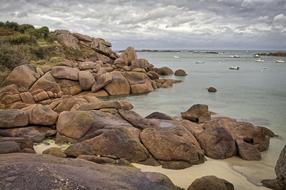 boats in harbor at Pink Granite beach