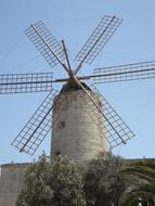 windmill with wings on a sunny day