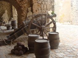 cannon and barrels in a medieval fortress