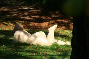 fat woman sunbathing in garden, Sculpture