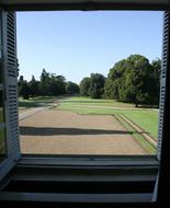 view of beautiful garden through window of Chateau, France, Loire Valley