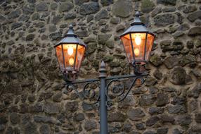 Lamp at stone Masonry Wall