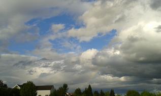 Beautiful landscape with the buildings and plants in Rheinhessen, Germany, under the clouds