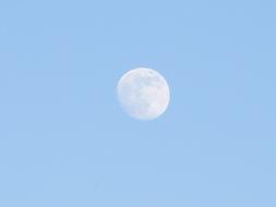 Beautiful, white Moon in the blue sky