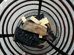 Firewood in the black fire basket