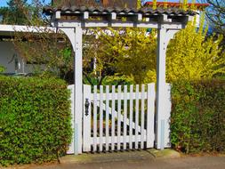 white gate to the garden