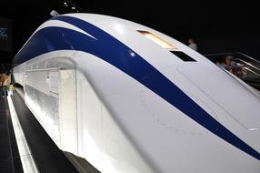 futuristic Linear Train on station at night, Japan