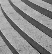 Close-up of the grey stairs in sunlight