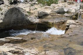 Beautiful Waterfalls of Sautadet near the plants, in France
